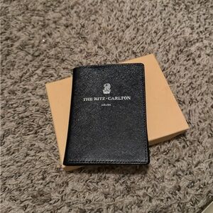 Ritz Carlton black leather wallet